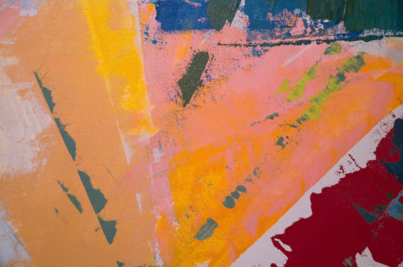 Abstract art with a mix of colors including yellow, pink, green, and red on a textured background.